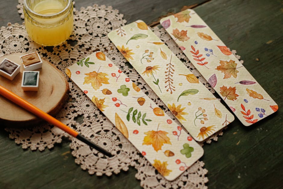 Charming handmade bookmarks featuring autumn watercolor designs, perfect for book lovers.
