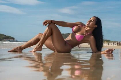 Woman in a bikini enjoying a sunny day at Cabo Frio beach, Brazil.