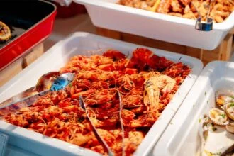 Delicious grilled shrimp platter served at a seafood buffet in Nha Trang, Vietnam.